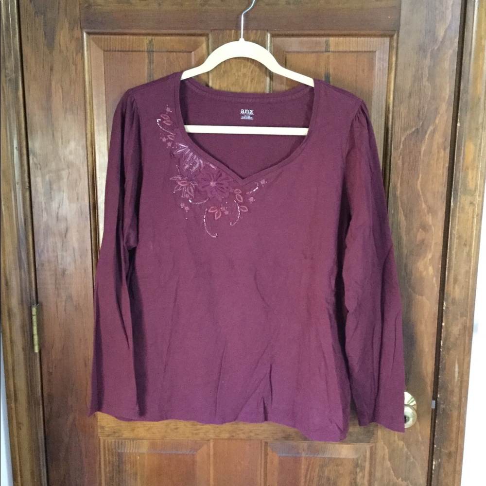 Wine-colored, beaded tee.